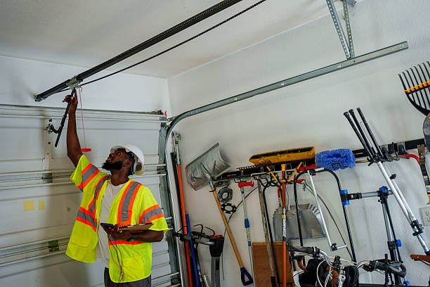 Professional Garage Door Panel Replacement technician working in Lake Mills, IA